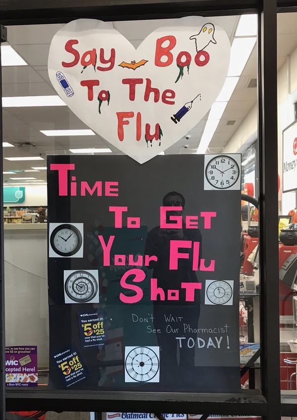 2 signs: Say Boo to the Flu / Time to get your shot